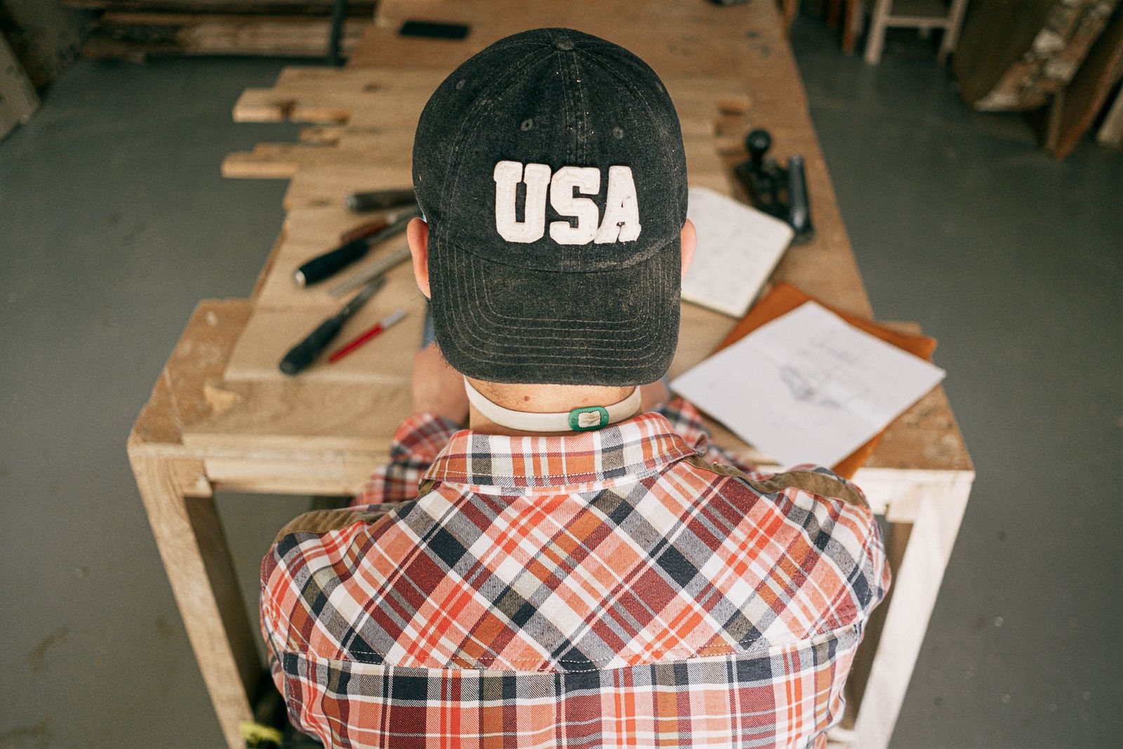 A carpenter at work in the atelier workshop